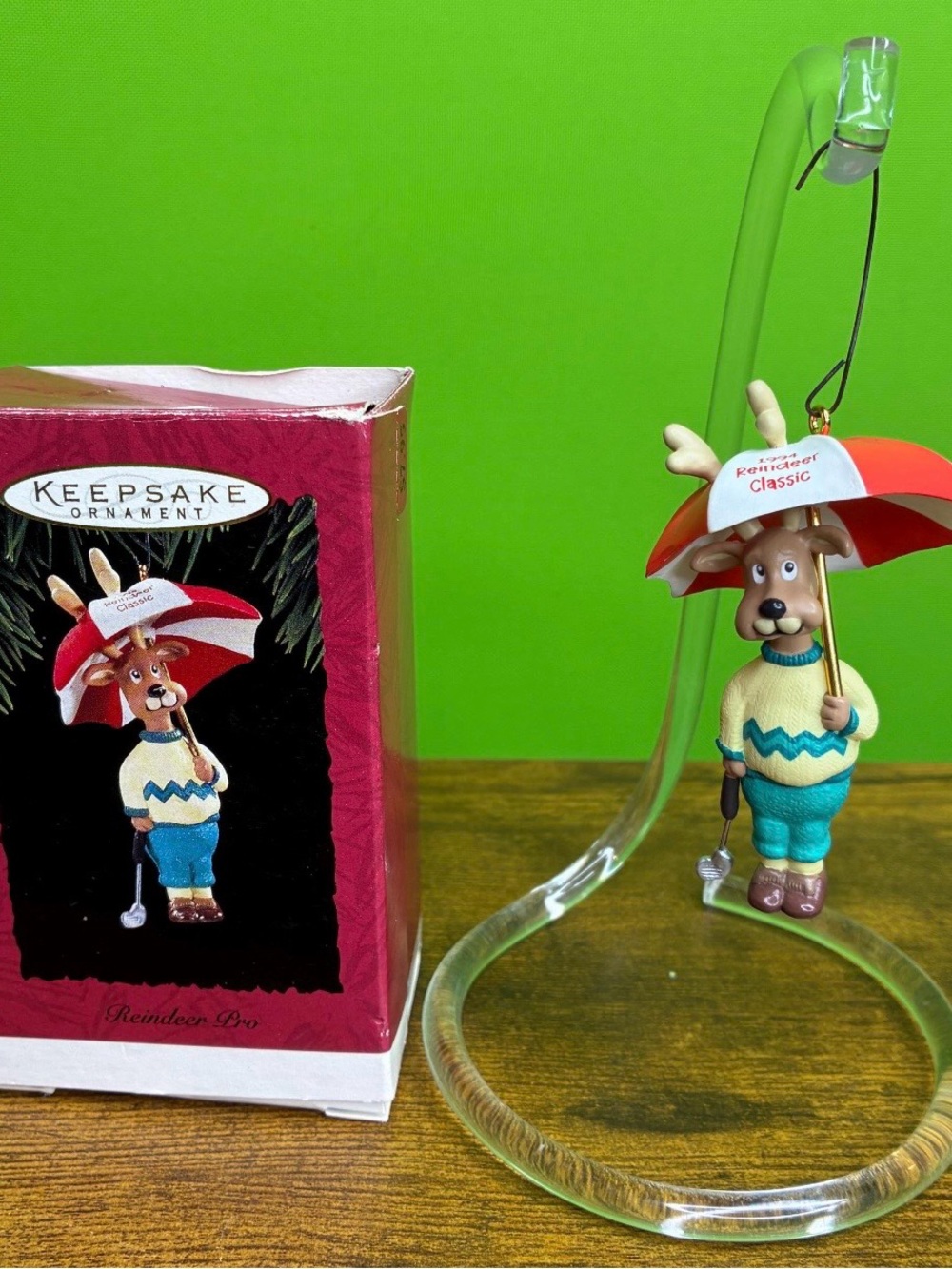 1994 Reindeer Pro Hallmark Keepsake Reindeer with Red Umbrella Ornament